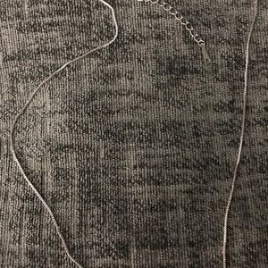 Two silver chains: each 18” with 2” Extender